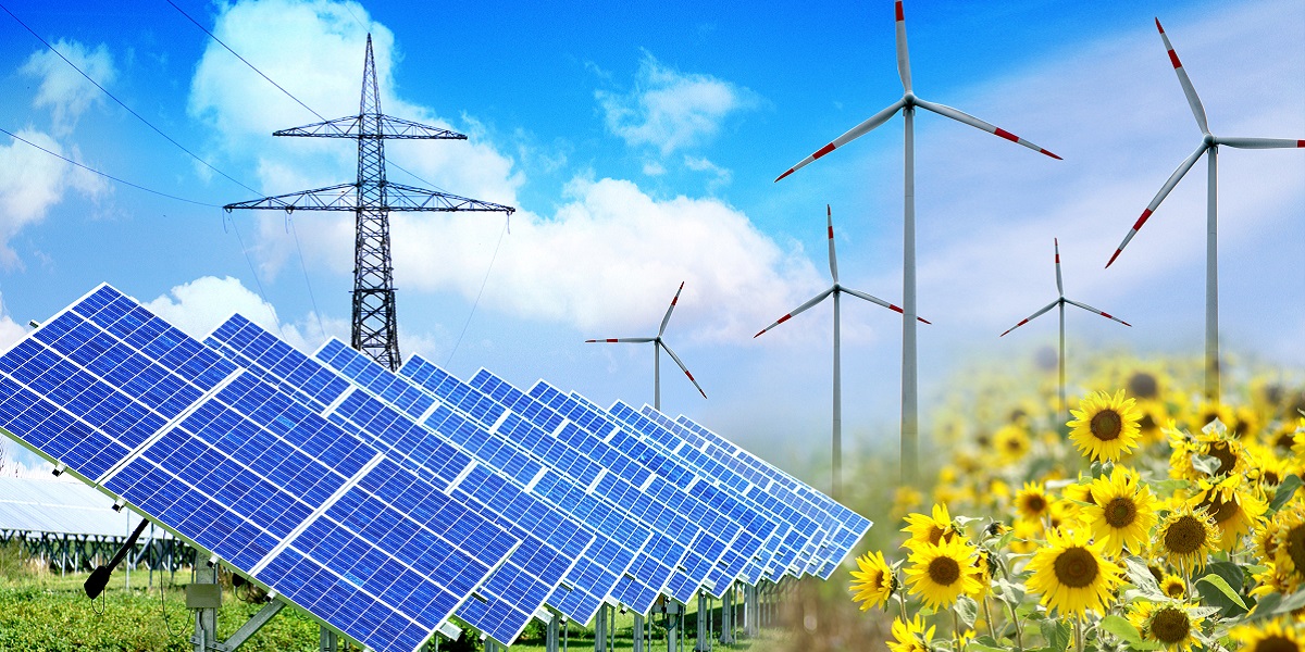 Bild: Darstellung verschiedener Energieanlagen: von links nach rechts: Photovoltaik, E-Türme, Windkraftanlagen, Sonnenblummen als Biomasse